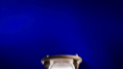 Animated hourglass and typography in a blue video edit